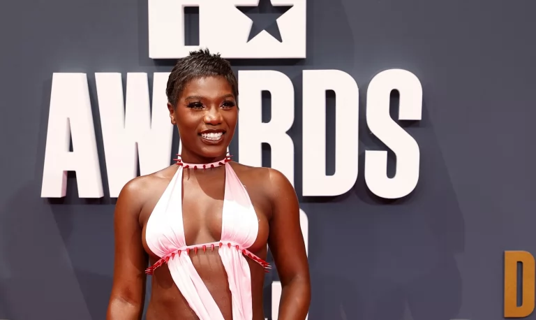 Doechii Goes Bold in Deep-Cut Halter Top With Pink Pointy Pumps at BET Awards 2023