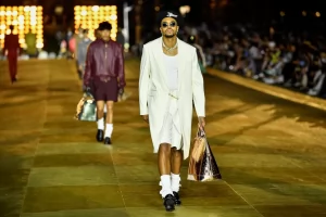 On the runway at Louis Vuitton men's spring summer '24, Pharrell's debut collection as men's creative director for the luxury brand.