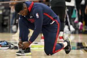 Dec 2, 2022; San Antonio, Texas, USA; New Orleans Pelicans forward Zion Williamson (1) ties his shoes before the game against the San Antonio Spurs at AT&T Center. Mandatory Credit: Scott Wachter-USA TODAY Sports
