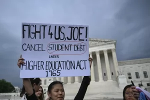 People rally against the U.S. Supreme Court's latest decisions to strike down Biden's student loan forgiveness plan on Friday, June 29. ANADOLU AGENCY VIA GETTY IMAGES